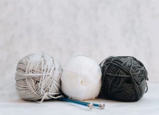 Knitters Around The World Are Knitting Sweaters For Sign-Posts
