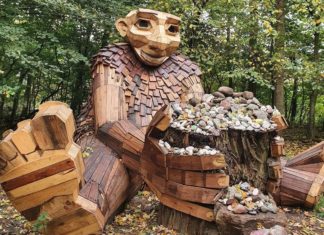 Artist Builds Giant Troll Sculptures Using Reclaimed Wood